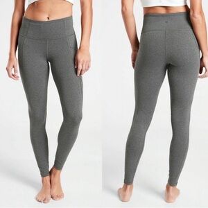 Athleta Stash Pocket Salutation Tight Leggings in Black Heather Size XS Petite